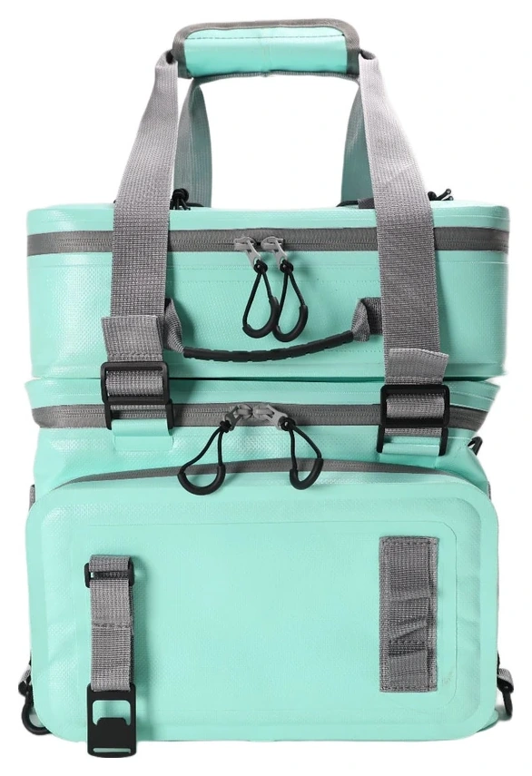 Teal two-tier modular paddle board cooler with grey straps and bungee cords