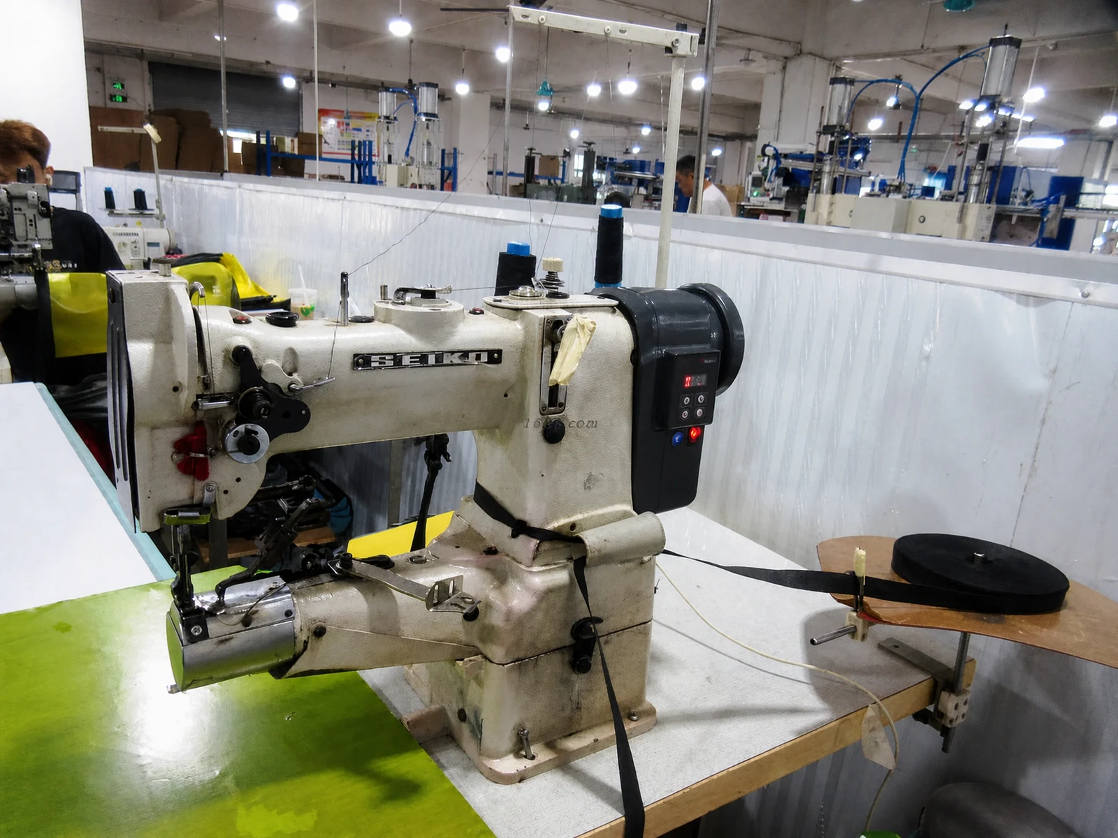 Industrial sewing machine and webbing at the DryCross factory