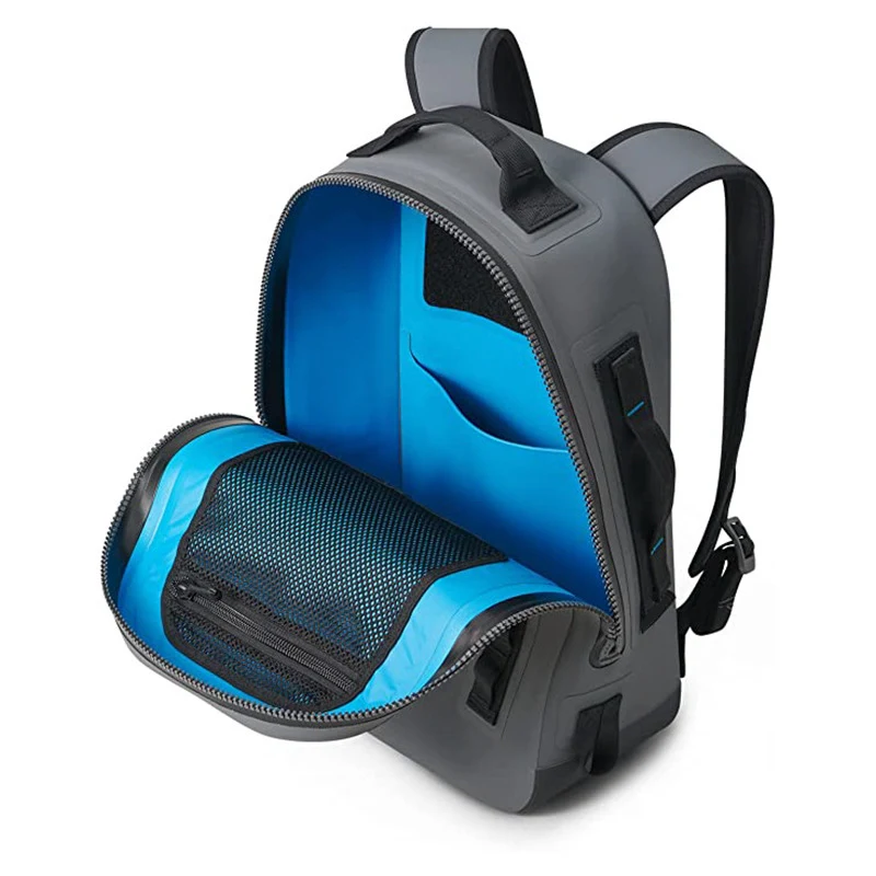 Open waterproof backpack showing internal construction and pockets