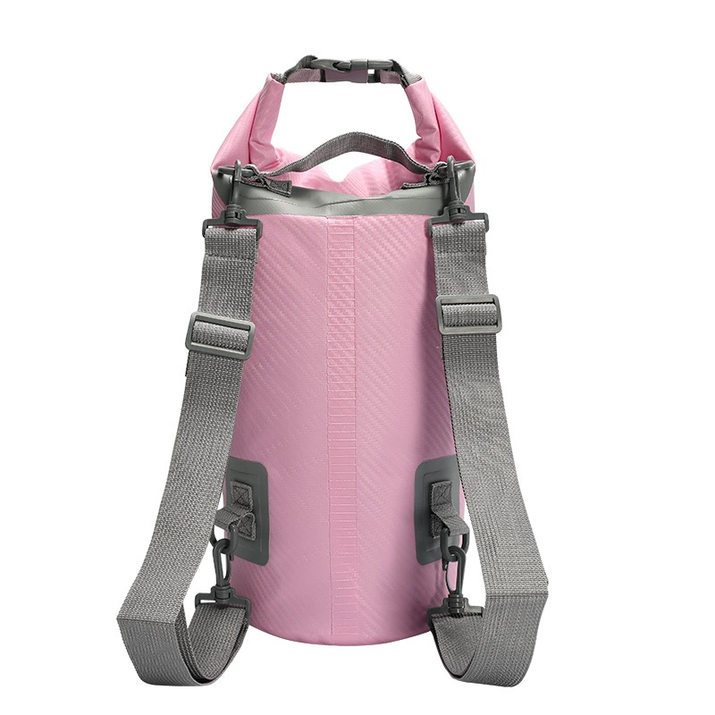 Buyer-supplied rear view of a pink roll-top dry bag with adjustable straps and removable hooks on a white background